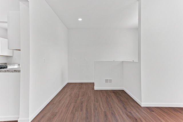 empty room featuring dark hardwood / wood-style floors