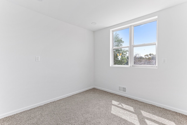 empty room featuring carpet floors