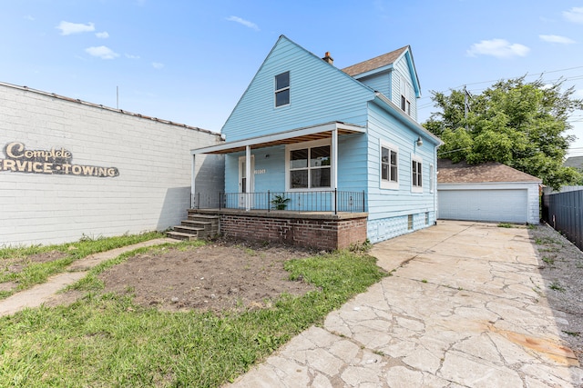 bungalow featuring an outbuilding, covered porch, and a garage