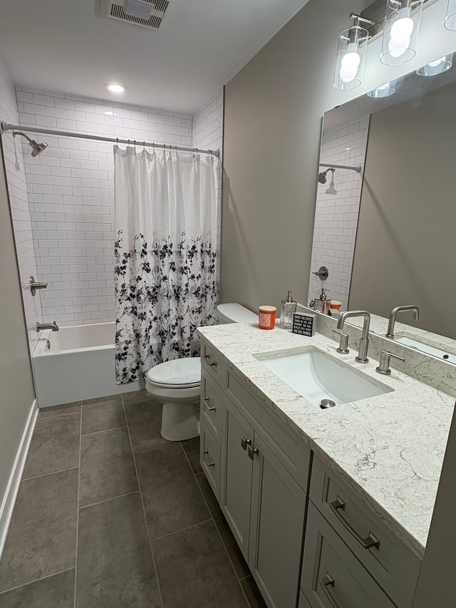1473 Mallard Cir, Owosso, MI 48867 - full bath with tile patterned flooring, toilet, vanity, visible vents, and shower / tub combo