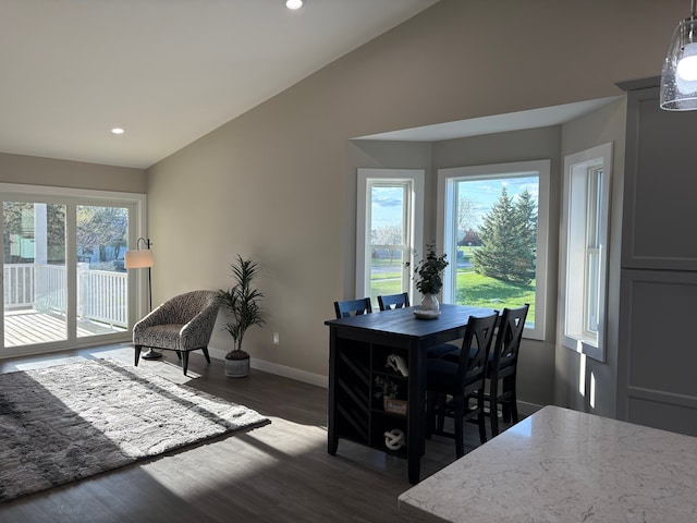 1473 Mallard Cir, Owosso, MI 48867 - dining room with dark wood-type flooring, recessed lighting, vaulted ceiling, and baseboards