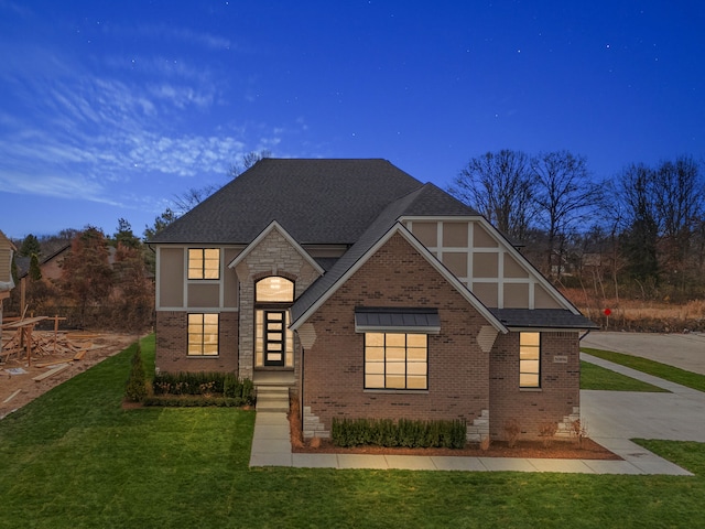 view of front of home with a front lawn