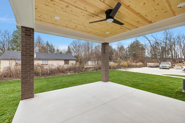 view of patio featuring ceiling fan