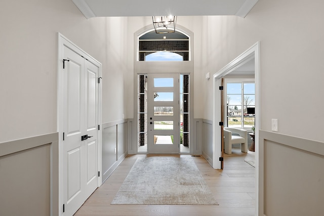 entryway with light hardwood / wood-style floors