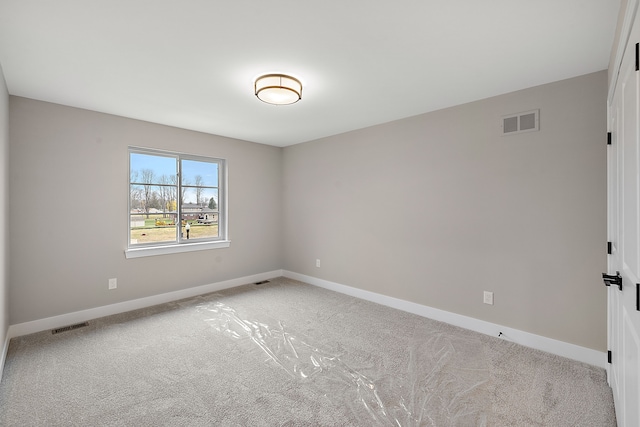 view of carpeted spare room