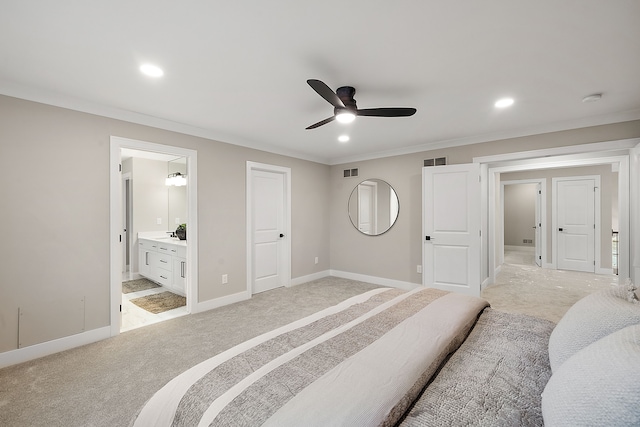 bedroom featuring ensuite bathroom, ceiling fan, ornamental molding, and light carpet