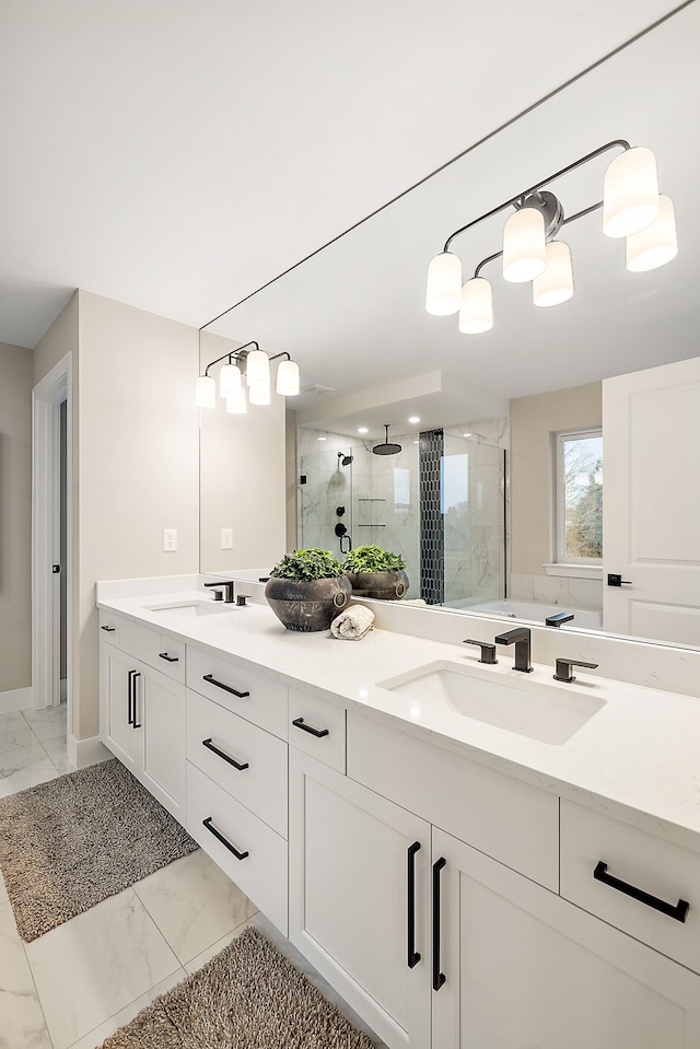 bathroom with vanity and an enclosed shower