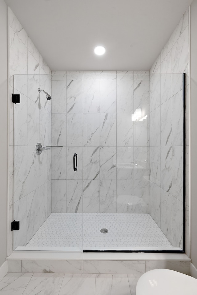 bathroom featuring walk in shower