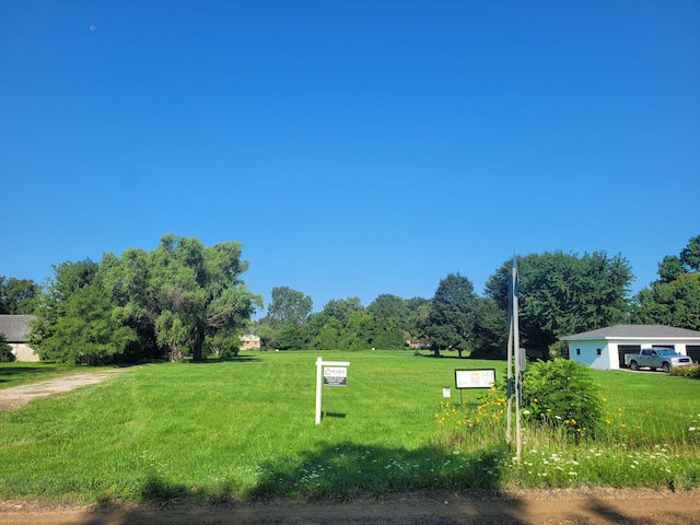 view of yard with a garage