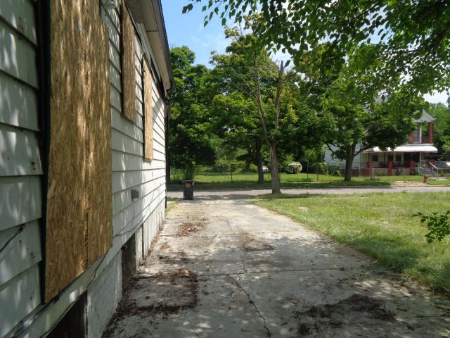 view of home's exterior featuring a lawn