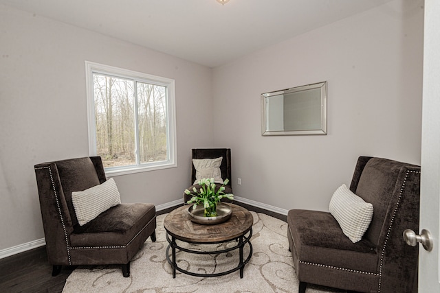 living area with wood-type flooring