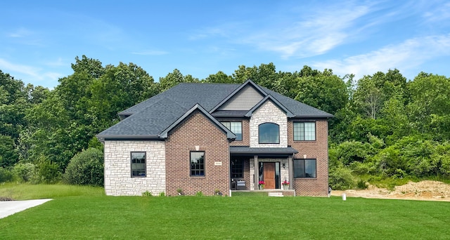 view of front of property with a porch and a front yard