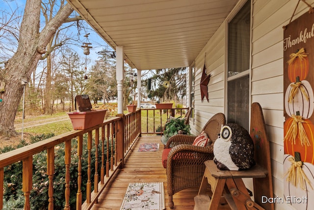 balcony featuring a porch