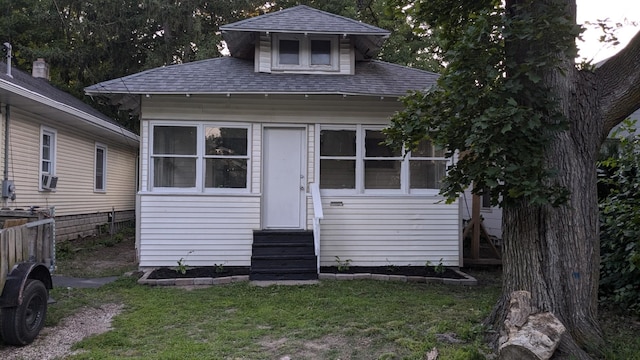 view of front of home with a front lawn