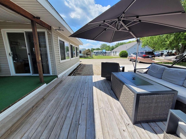 831 S Main St, Au Gres, MI 48703 - deck featuring outdoor lounge area