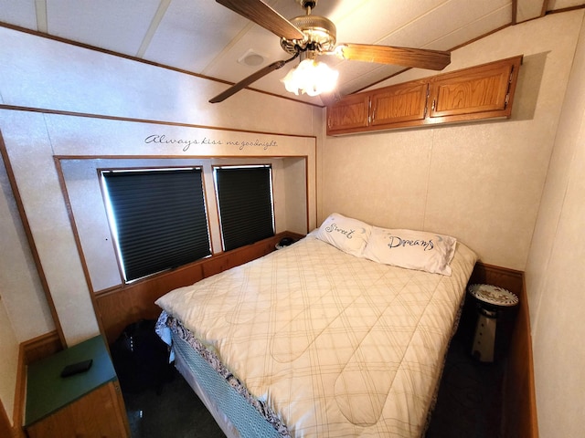 831 S Main St, Au Gres, MI 48703 - bedroom featuring vaulted ceiling and a ceiling fan