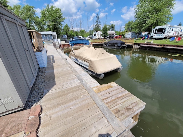 831 S Main St, Au Gres, MI 48703 - dock area featuring a water view