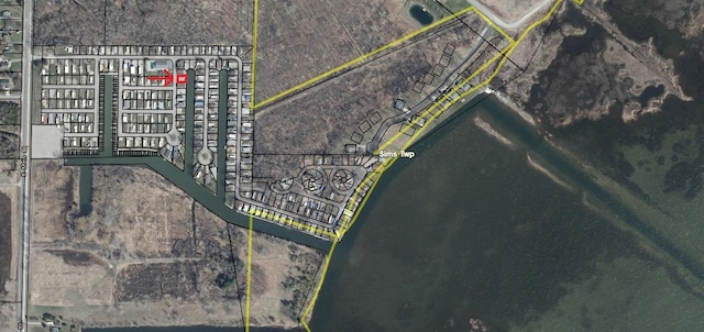 831 S Main St, Au Gres, MI 48703 - aerial map of property and surrounding area with property parcel outlined