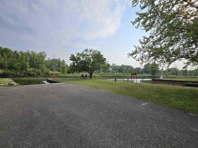 831 S Main St, Au Gres, MI 48703 - view of road featuring a water view