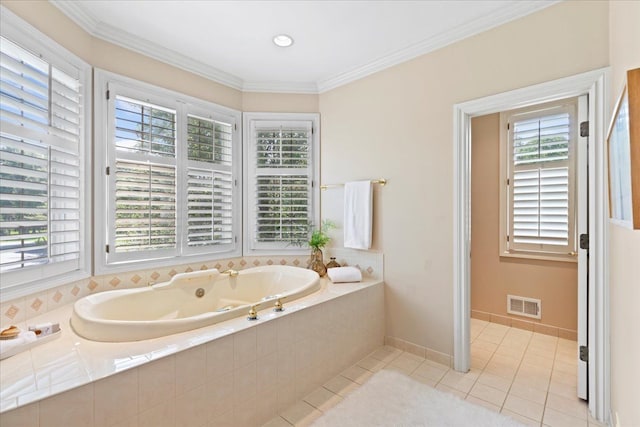 bathroom featuring tile patterned flooring, tiled bath, and ornamental molding