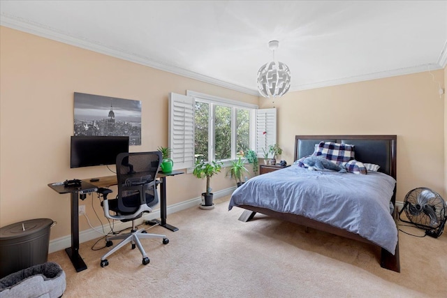 carpeted bedroom featuring crown molding and a chandelier