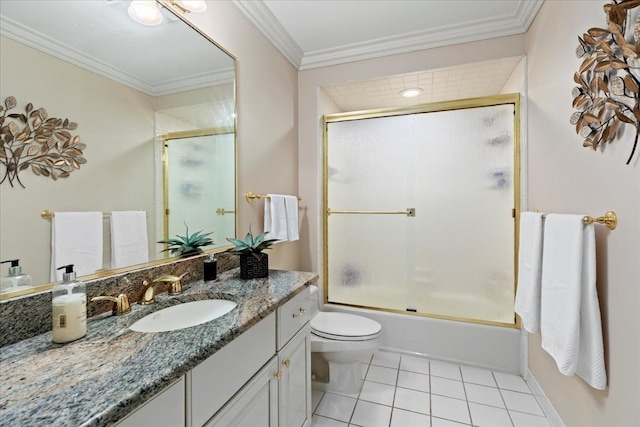 full bathroom featuring tile patterned floors, bath / shower combo with glass door, toilet, vanity, and ornamental molding