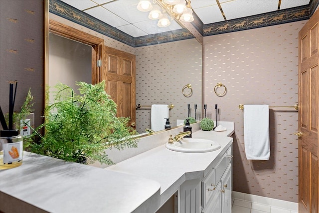 bathroom with tile patterned flooring and vanity