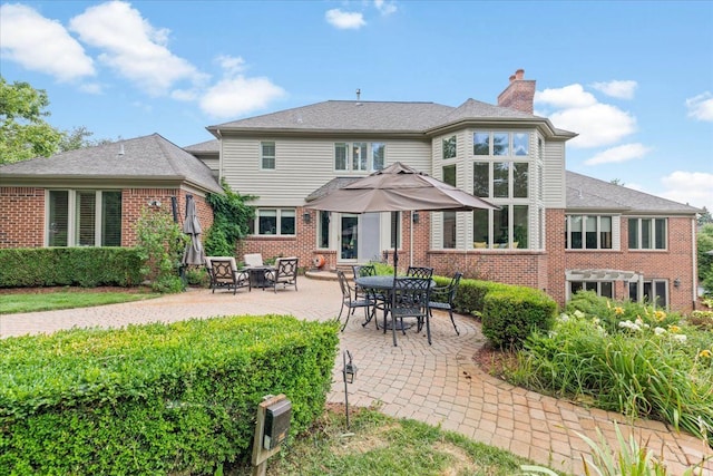 rear view of property with a patio