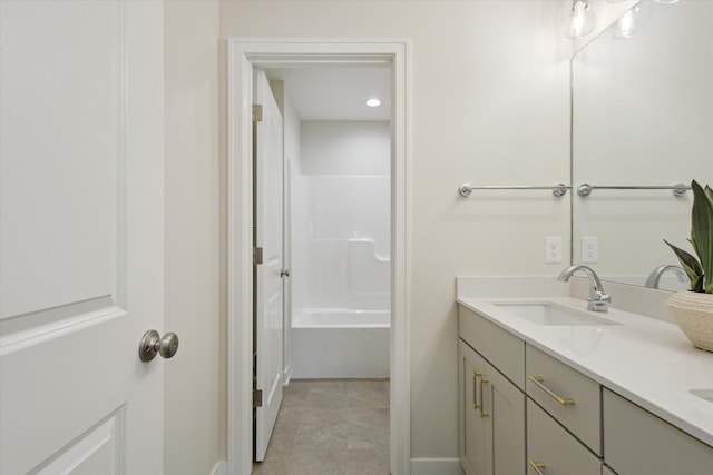 full bath featuring a sink and double vanity