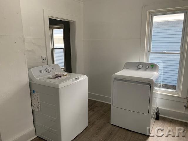 551 Tabor St, Adrian, MI 49221 - laundry room featuring washing machine and dryer and dark wood-style floors