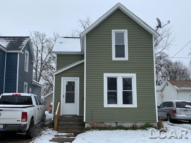 551 Tabor St, Adrian, MI 49221 - traditional-style house featuring entry steps