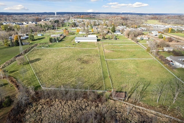 birds eye view of property featuring a rural view