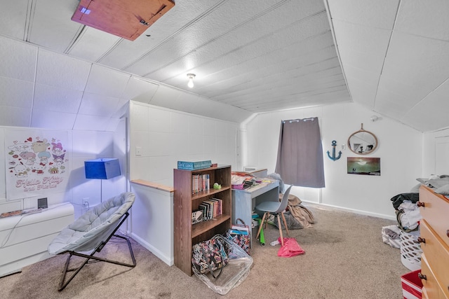 interior space with light carpet and vaulted ceiling