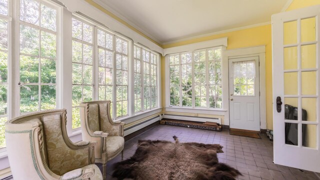 15 S Broad St, Hillsdale, MI 49242 - sunroom / solarium with a baseboard radiator, ornamental molding, tile patterned floors, and french doors