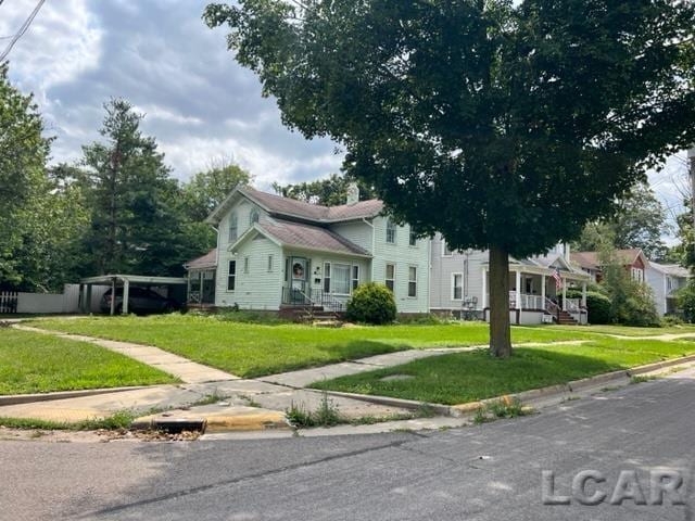 view of front of home with a front yard