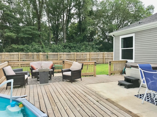 wooden terrace featuring an outdoor hangout area