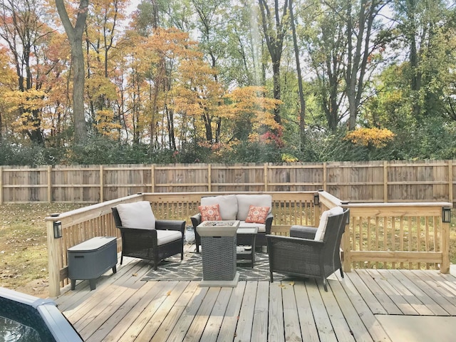 wooden deck with an outdoor hangout area