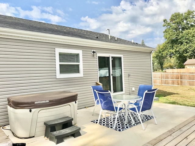 view of patio / terrace featuring a hot tub