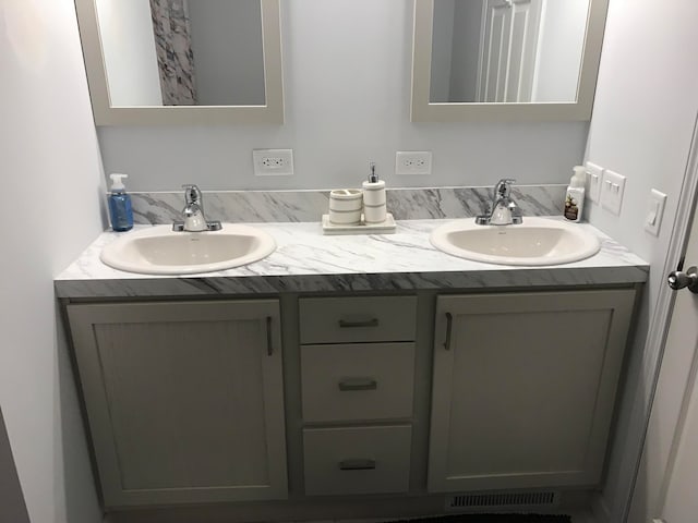 bathroom featuring vanity