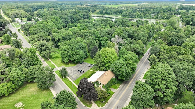 801 Portage Ave, Three Rivers, MI 49093 - view of property location featuring a nearby body of water and a forest
