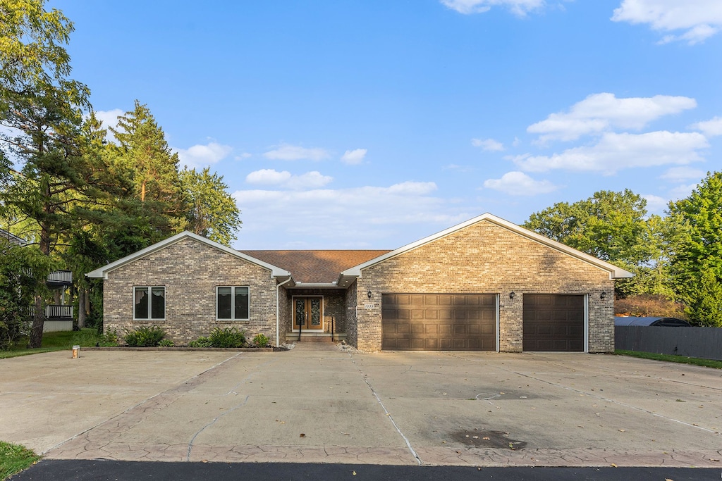 ranch-style home with a garage