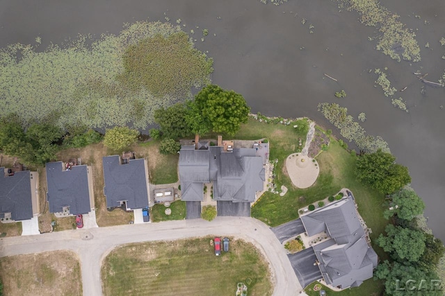 bird's eye view with a water view