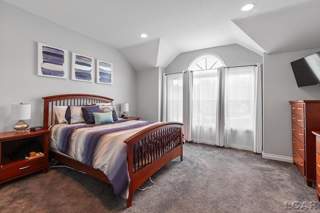 carpeted bedroom featuring vaulted ceiling