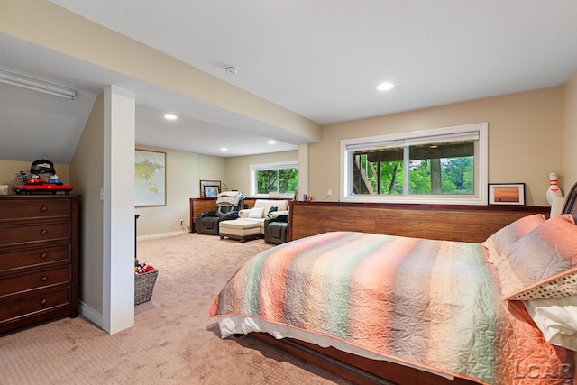 bedroom featuring light colored carpet