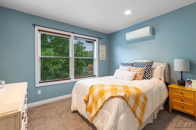 carpeted bedroom with a wall unit AC