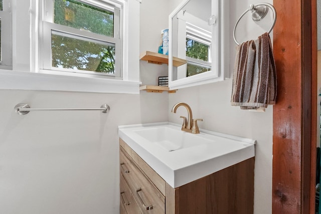 bathroom with a wealth of natural light and vanity