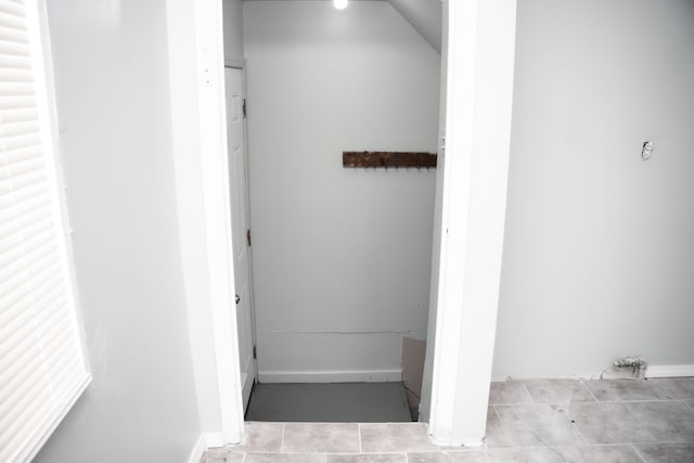 bathroom with tile patterned floors