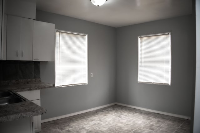 interior space with sink and a healthy amount of sunlight