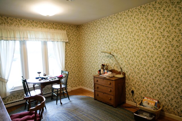 3447 200th Ave, Reed City, MI 49677 - office featuring baseboards, wallpapered walls, and wood finished floors