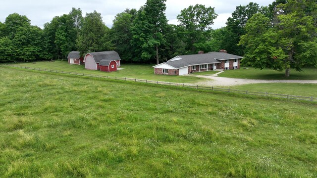 3447 200th Ave, Reed City, MI 49677 - view of yard with a barn, dirt driveway, and an outdoor structure